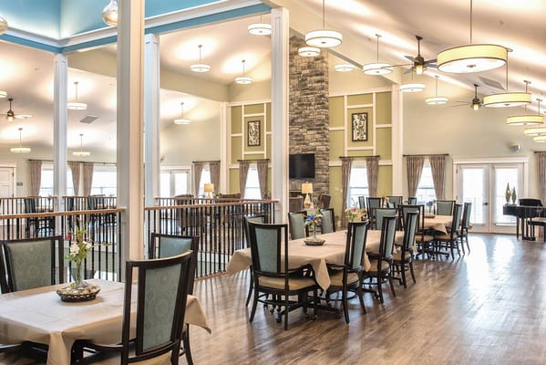Elegant dining area with tables and light fixtures