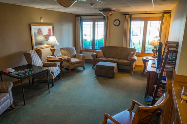 Comfortable living room with seating and a view outside