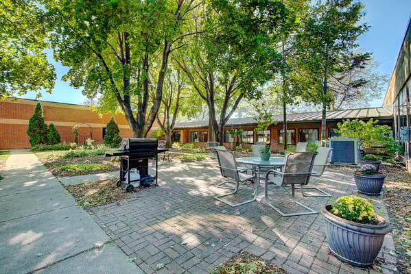 Outdoor garden area with seating and landscaping