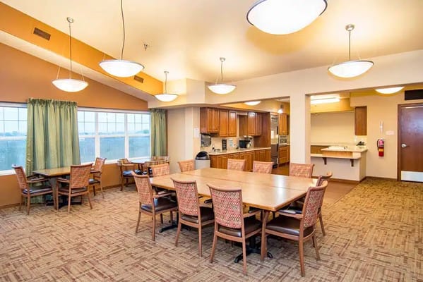 Bright dining room with tables and chairs