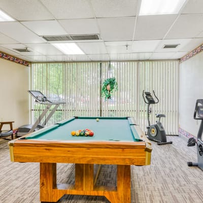 Interior view of a game room with a pool table