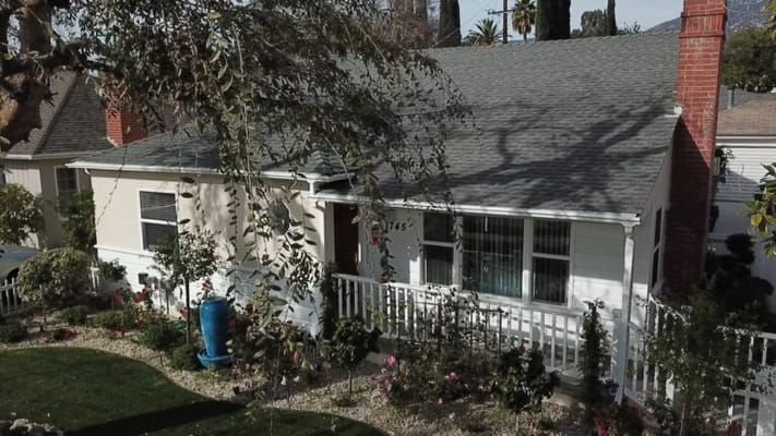 Front view of Grant Serenity Homes with landscaped garden