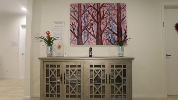 Interior view of a common area decorated with artwork