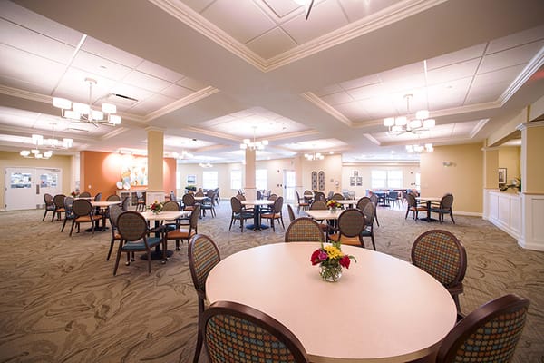 Bright interior common area with seating and decor