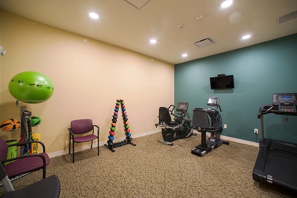 Interior view of a fitness room with equipment