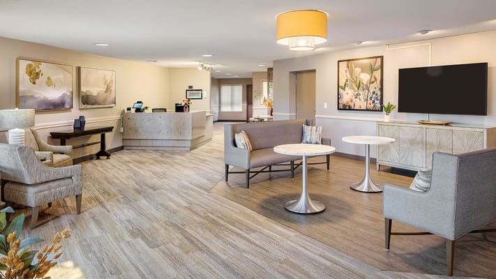 Bright interior of a common area with seating.