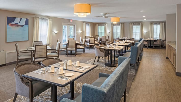 Bright dining area with tables set for meals