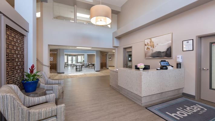 Welcoming lobby area with seating and reception desk