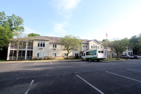 Exterior view of Bloom At Eagle Creek with a van in the parking lot