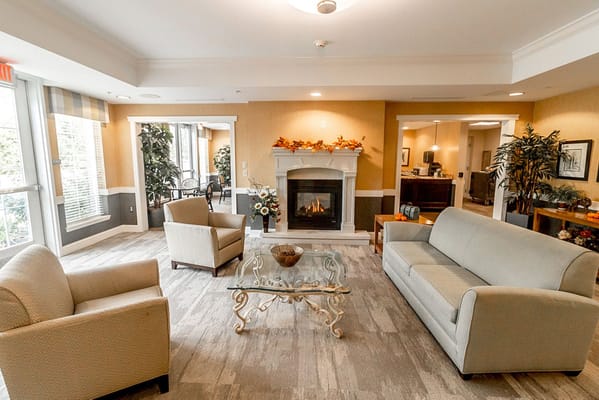 Comfortable seating area with a fireplace in the lobby