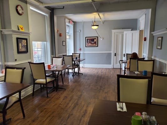 Dining room with tables set for residents