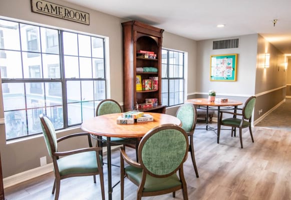 Game room with tables and chairs at La Posada