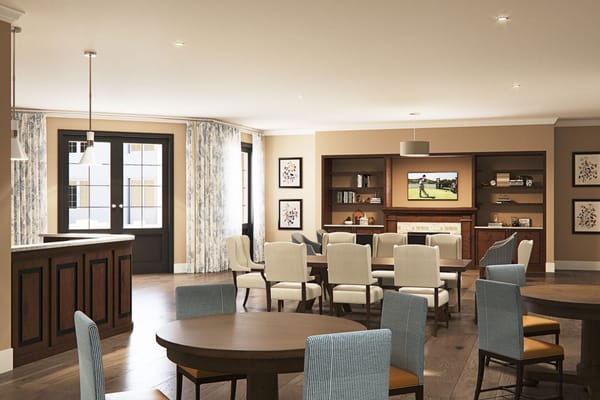 Bright common area with seating and television