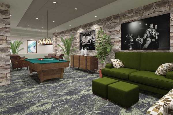 Cozy game room with billiards table and comfortable seating