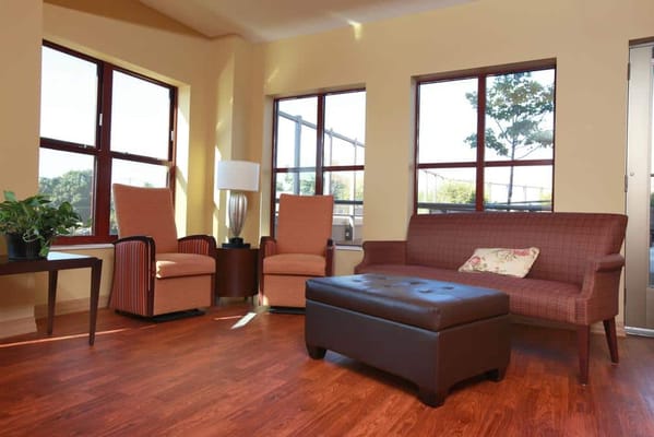 Comfortable lounge area with seating and natural light