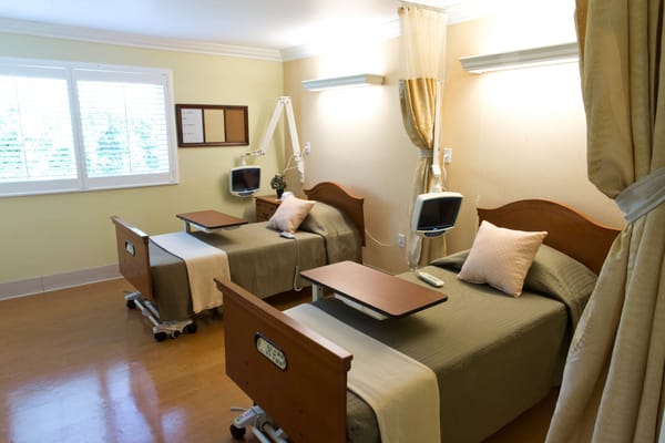 Interior view of a shared resident room with two beds