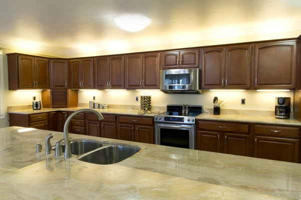 Modern kitchen with wooden cabinets and appliances