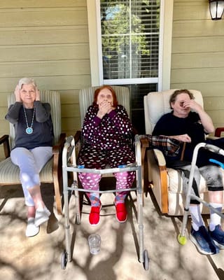 Residents enjoying the outdoor area of the facility