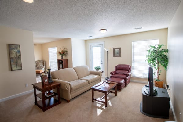 Comfortable living area with furniture and natural light