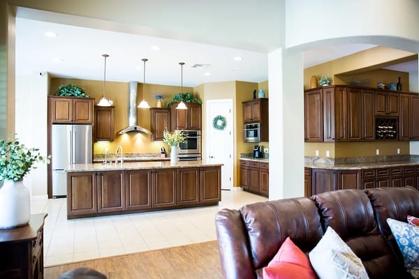 Bright common area with modern kitchen and seating