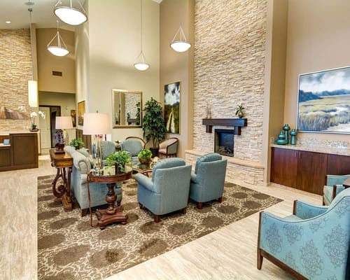 Cozy lobby with seating areas and decorative elements.