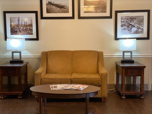 Cozy common area with seating and lamps
