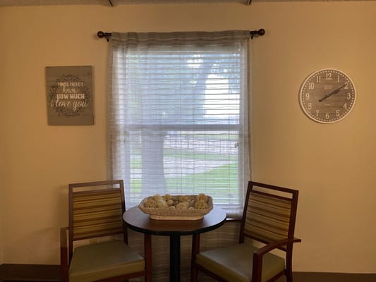 Cozy seating area with natural light and decor