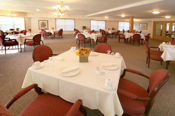 Dining area with tables set for a meal