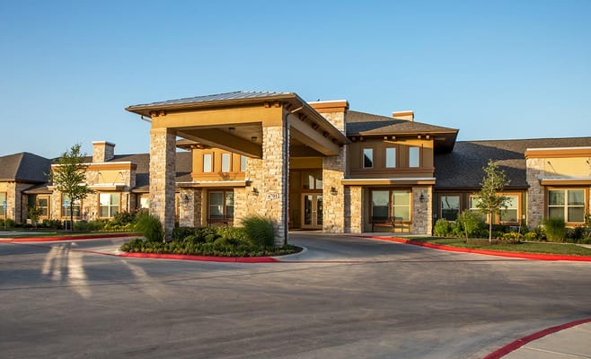 Main entrance of Orchard Park of Kyle senior living facility