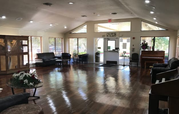 Common area of a senior living facility with seating