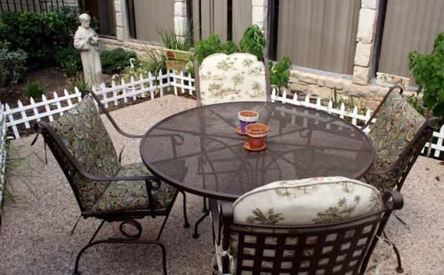 Outdoor seating area with a table and chairs