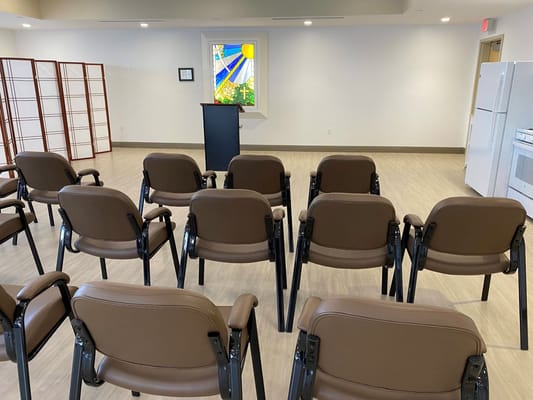 Interior view of a meeting space set up with chairs