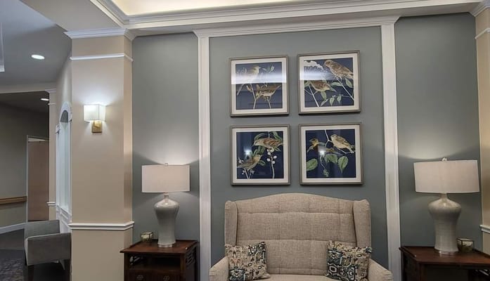 Cozy interior corner with artwork and lamps