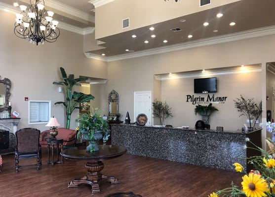 Welcoming interior lobby with reception area and decor