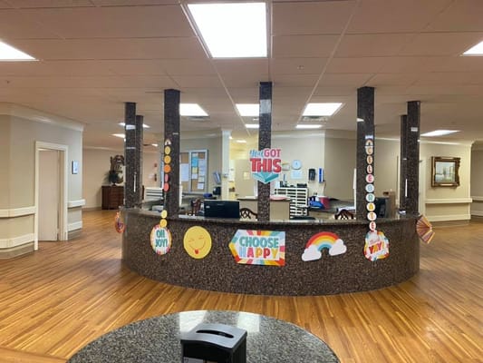 Interior of the facility's lobby with motivational decorations
