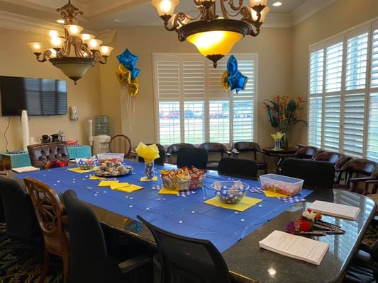 Celebration setup in a dining area with decorations