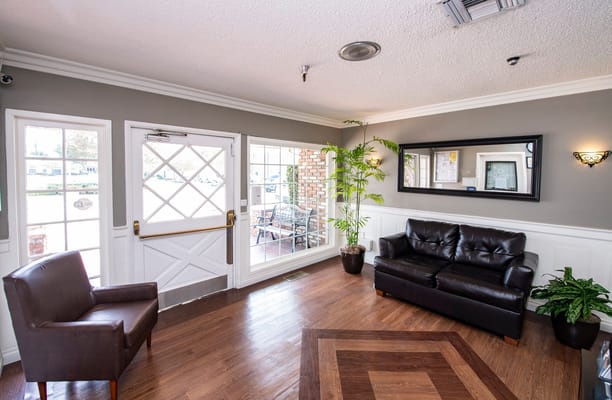 Bright interior lobby with seating area and natural light