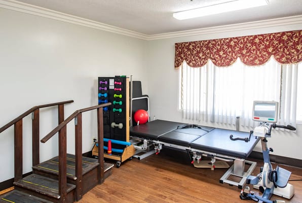Interior view of a rehabilitation room with equipment