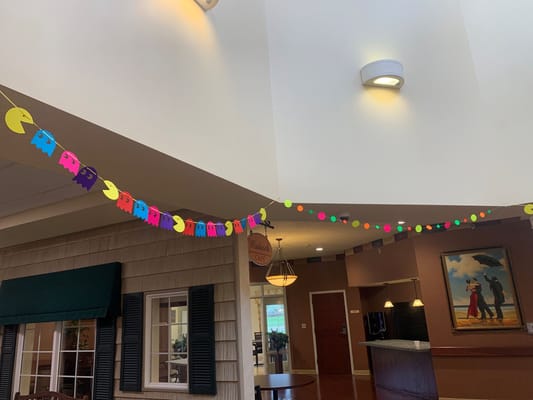 Colorful decorations including Pac-Man and ghost cutouts