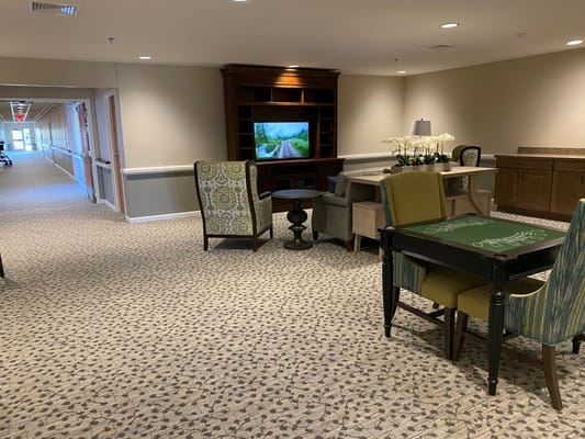 Common area with seating and television