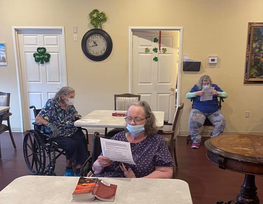 Residents reading in a common area