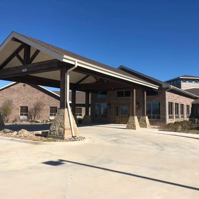 Front entrance of St. Anthony's Care Center with a covered driveway.