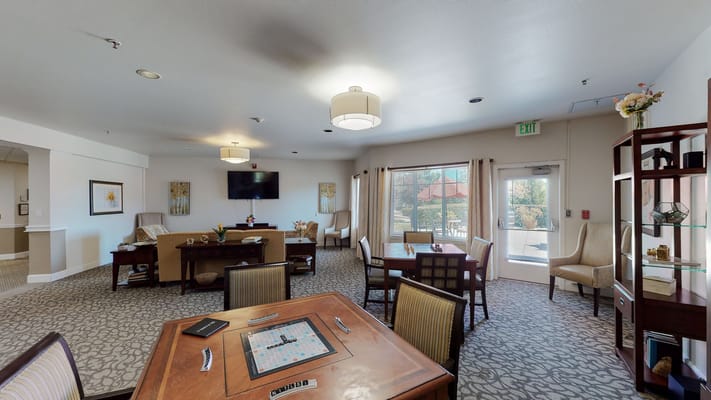 Cozy common area with seating and natural light