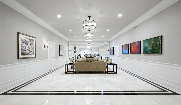 Spacious and stylish lobby with seating area and artistic decor