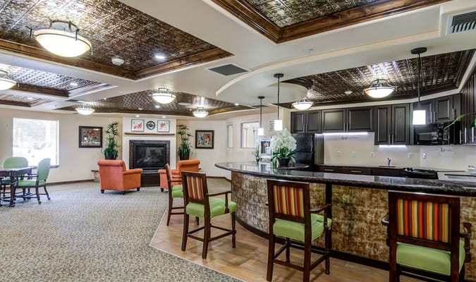 Interior common area with seating and kitchen counter