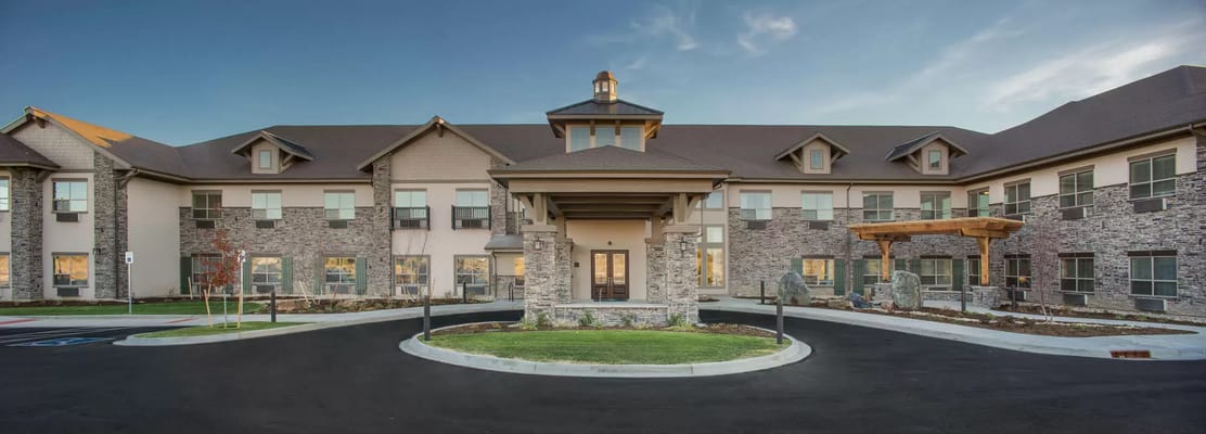 Front view of The Peaks at Old Laramie Trail senior living facility.