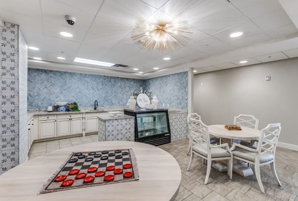 Modern common area with kitchen and dining table