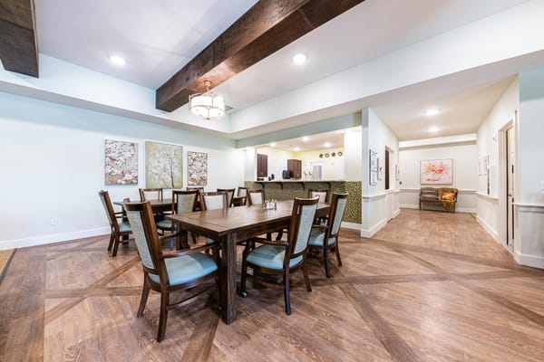 Overview of the dining area in The Philomena senior living facility.