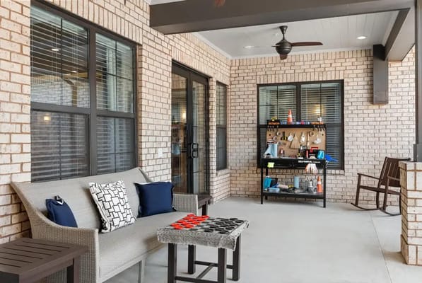 Outdoor patio with seating and activity table