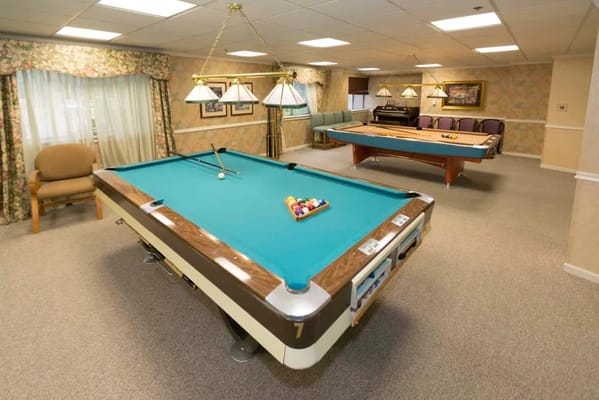 Interior of a recreational room with pool tables